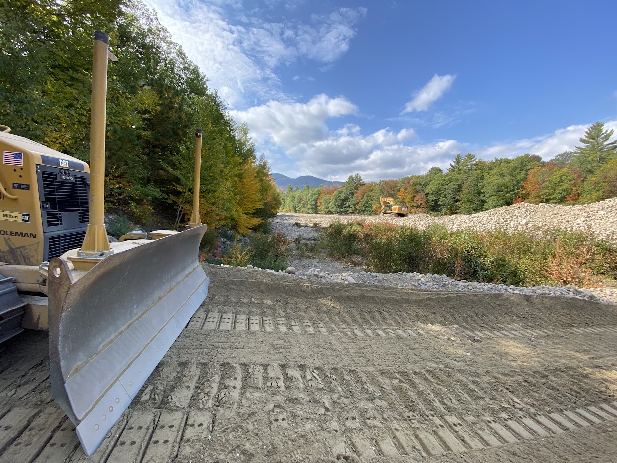 Stream restoration earthwork with a CAT dozer — conservation practice by GSS