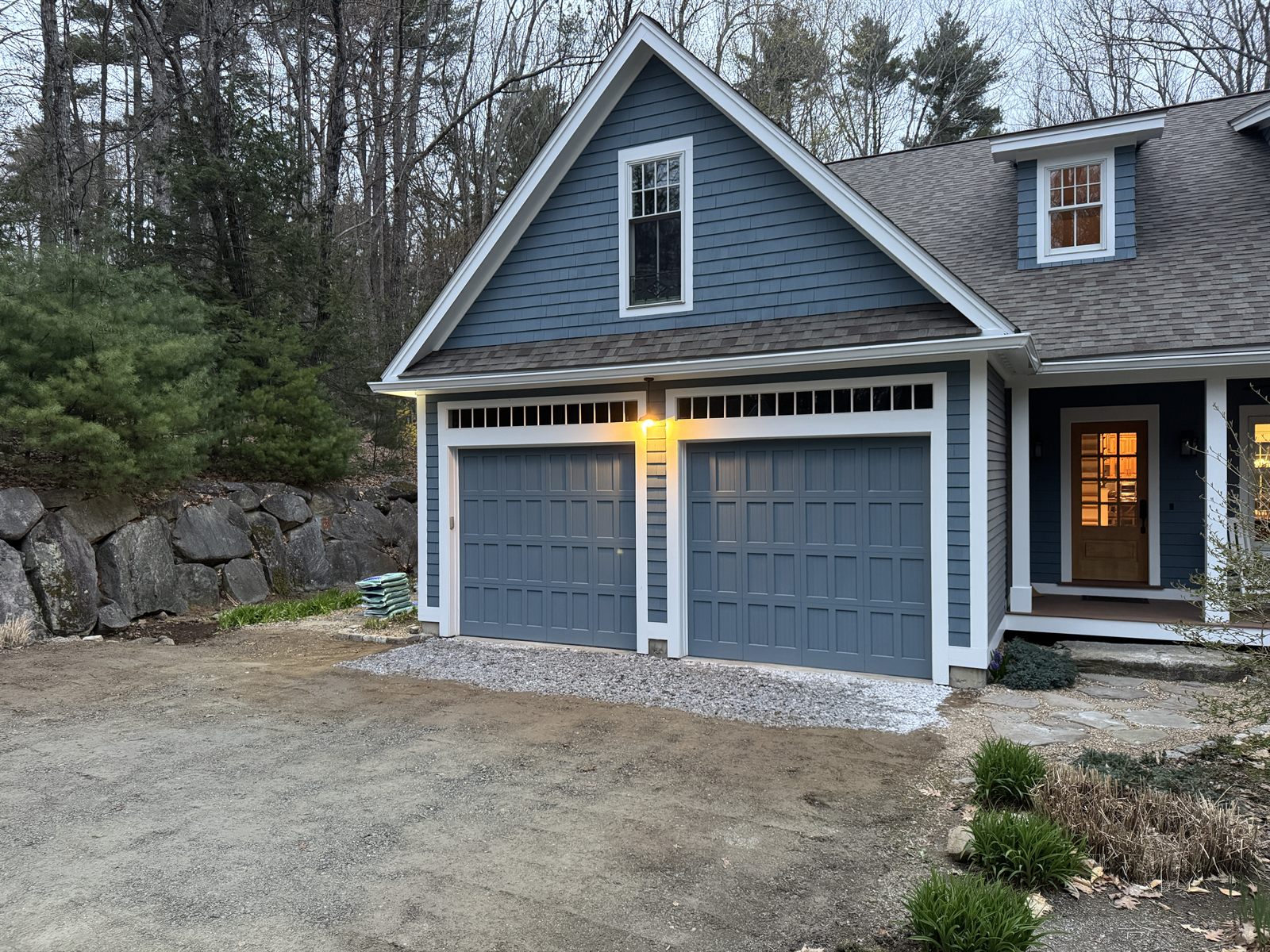 Finished graded apron sending clean water to a controlled outlet — GSS, Seacoast NH