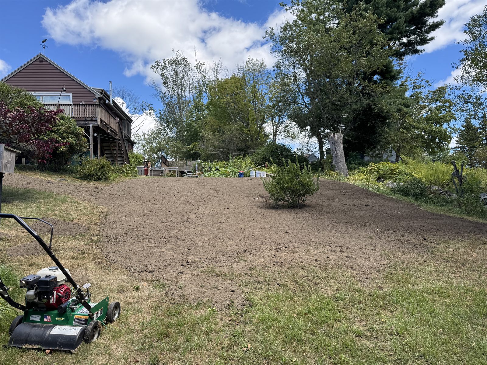Graded lawn seedbed ready for hydroseed — GSS soil-first lawn work